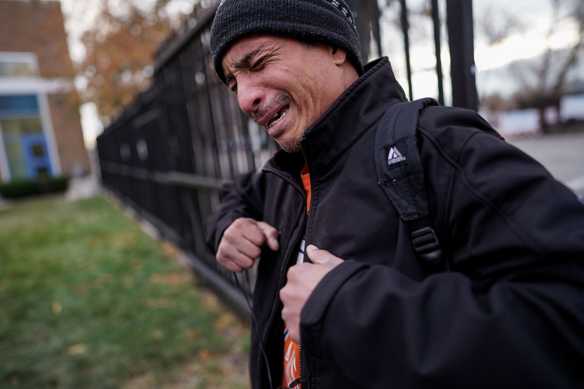 Richard Adams, 47, becomes emotional as he recounts his experiences with homelessness and addiction while talking with journalists outside Catholic Community Services’ Weigand Center in Salt Lake City on Thursday, Nov. 21, 2019.
