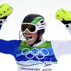 Italy's Giuliano Razzoli celebrates his gold-medal run in the finish area of the men's slalom race of the Vancouver 2010 Winter Olympics at the Whistler Creekside alpine skiing venue on Saturday. 
