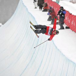 In this Feb. 5, 2011, photo, Sarah Burke, of Canada, competes in the women\'s halfpipe finals at the freestyle skiing world championships in Park City, Utah. Burke took fourth in the event. Burke succumbed to injuries Thursday that she sustained in a fall while training in the superpipe at Park City Mountain Resort.