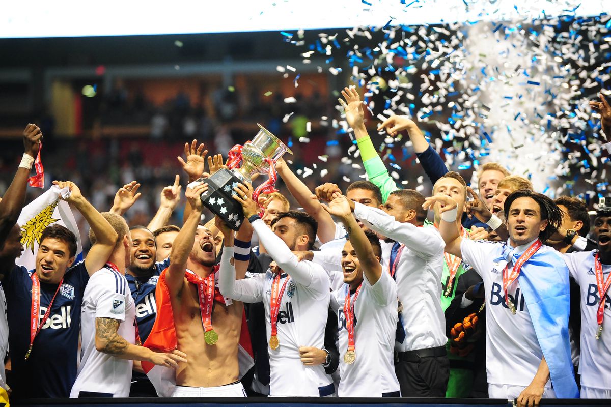 The Whitecaps lift the trophy in front of an overjoyed crowed at BC Place.
