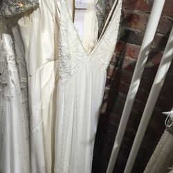 Thin strap bridal gown, $2,270 (was $4,540)