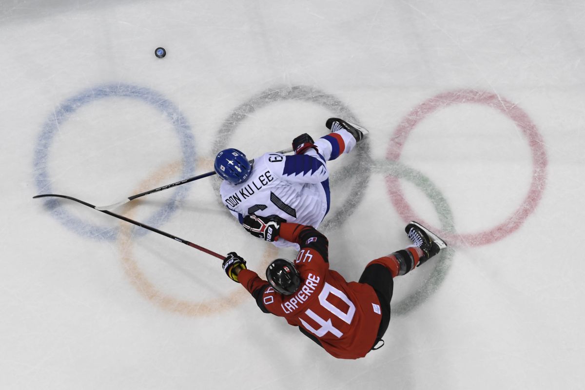 Olympics: Ice Hockey-Men Team Group A - CAN-KOR