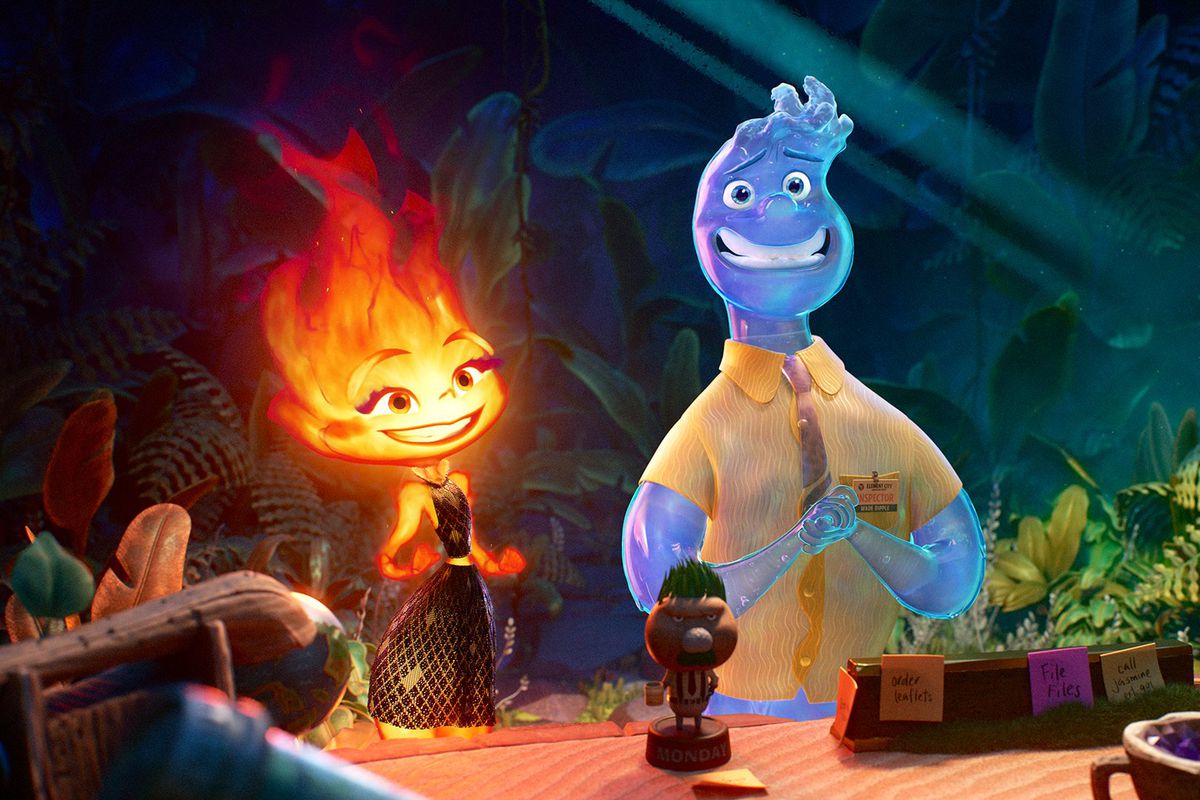 Ember and Wade from Pixar’s Elemental standing next to each other