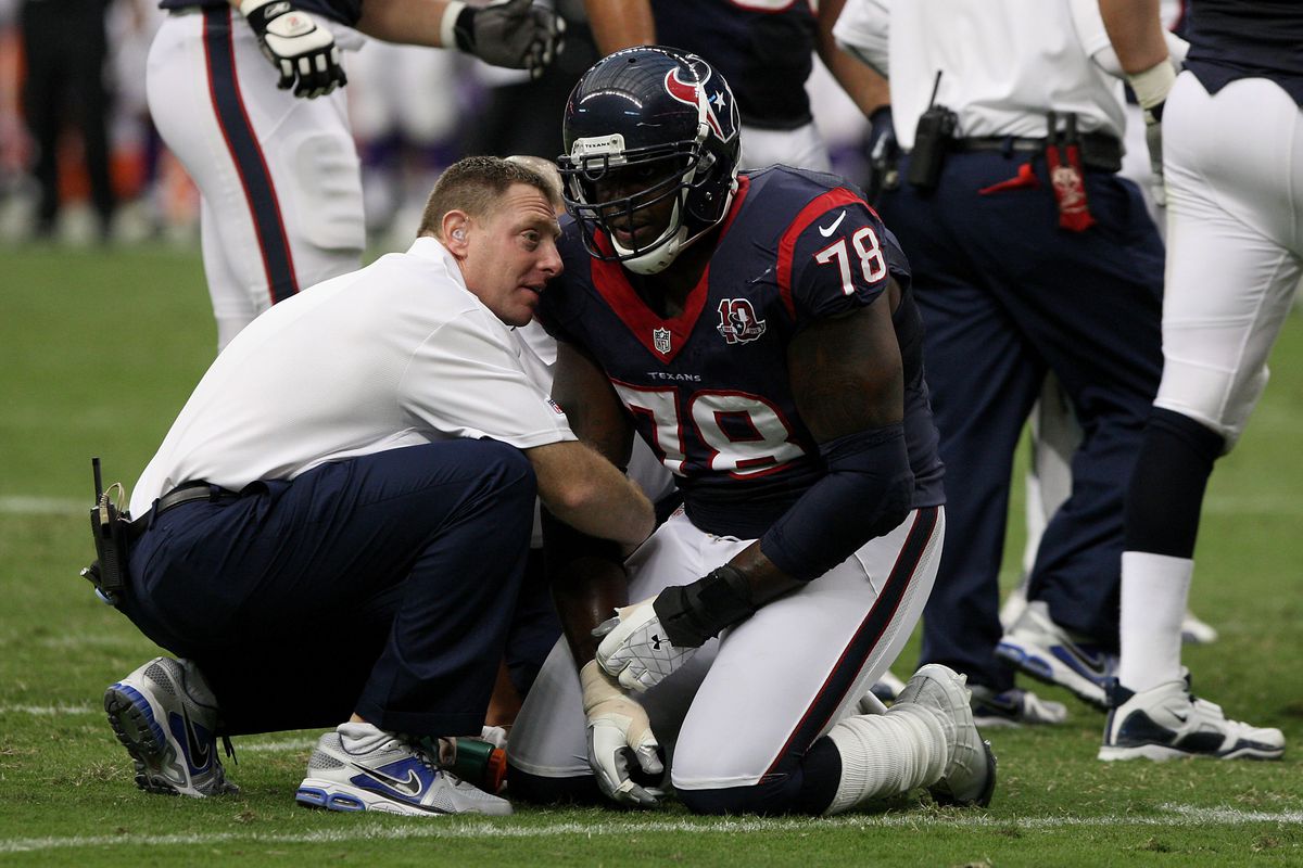 August 30, 2012; Houston, TX, USA; Houston Texans tackle Rashad Butler (78) is evaluated by medical staff during a preseason game against the Minnesota Vikings at Reliant Stadium. Mandatory Credit: Troy Taormina-US PRESSWIRE