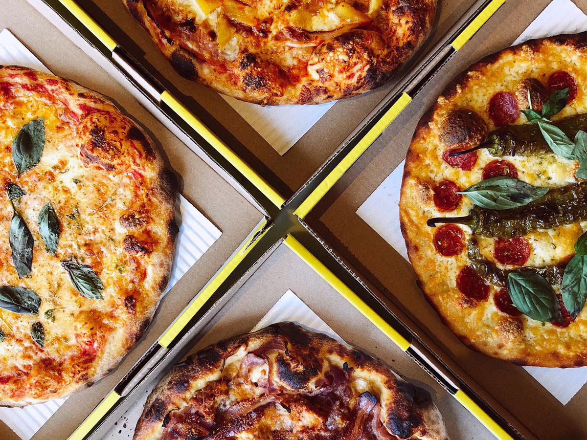 four pizza boxes