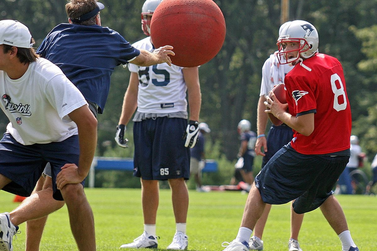 <em>Belichick and O'Connell playing dodgeball at Thursday's a.m. practice.</em>