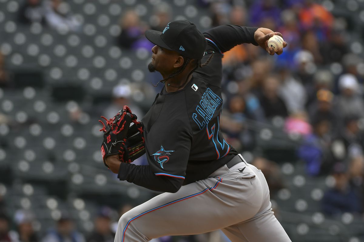 Miami Marlins starting pitcher Edward Cabrera (27) throws a pitch in the first inning against the Colorado Rockies at Coors Field.