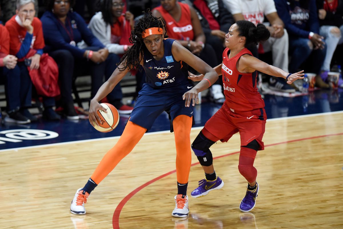 Jonquel Jones of the Connecticut Sun handles the ball against Kristi Toliver of the Washington Mystics in Game 5 of the 2019 WNBA Finals at St Elizabeths East Entertainment &amp; Sports Arena on October 10, 2019 in Washington, DC.