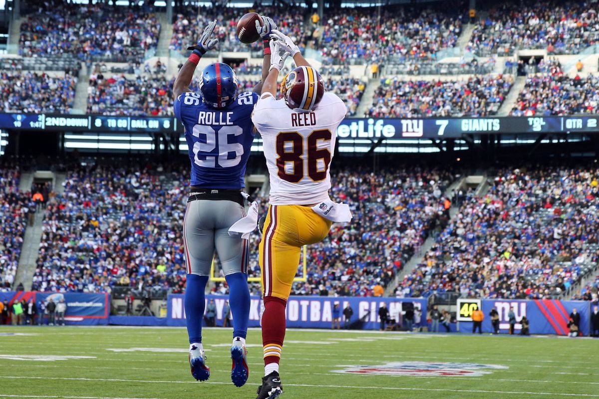 New Bears safety Antrel Rolle keeps a ball from the Redskins. As is tradition.