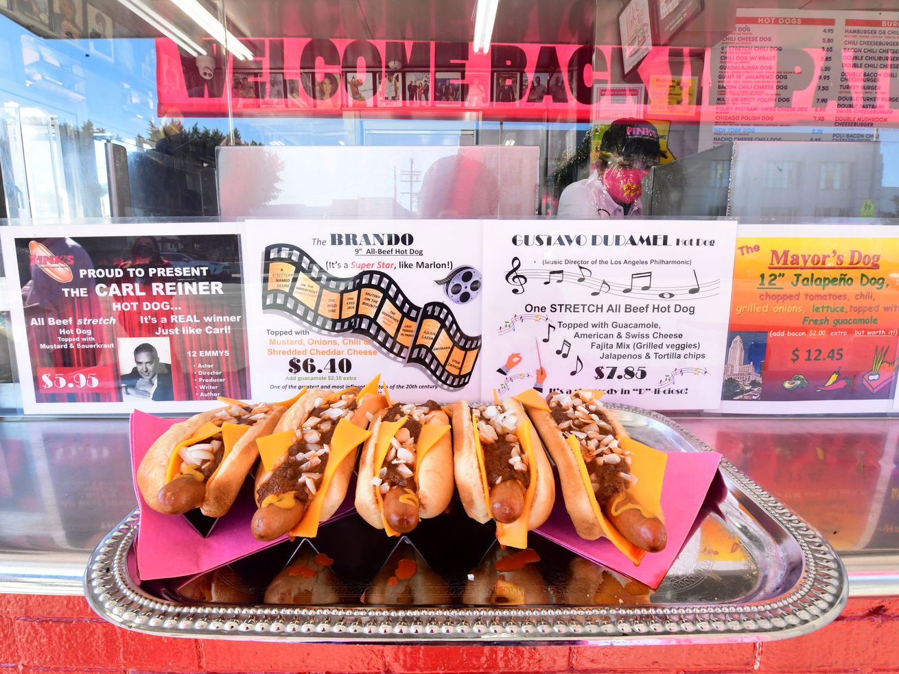 A tray of hotdogs in buns on the counter at Pink’s Hot Dogs in Los Angeles.