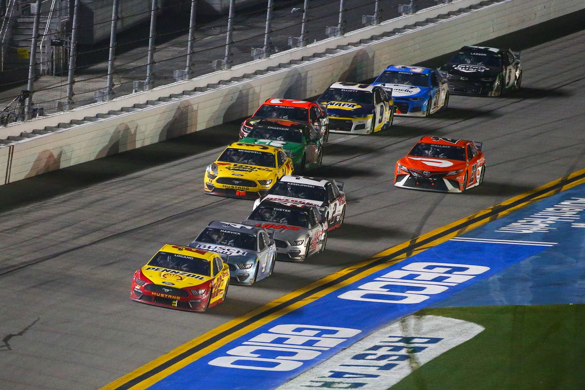 Joey Logano, driver of the #22 Team Penske Shell Pennzoil Ford Mustang, leads Kevin Harvick, driver of the #4 Stewart-Haas Racing Busch Light #TheCrew Ford Mustang, during the Daytona 500 on February 14, 2021 at Daytona International Speedway in Daytona Beach. Fl.