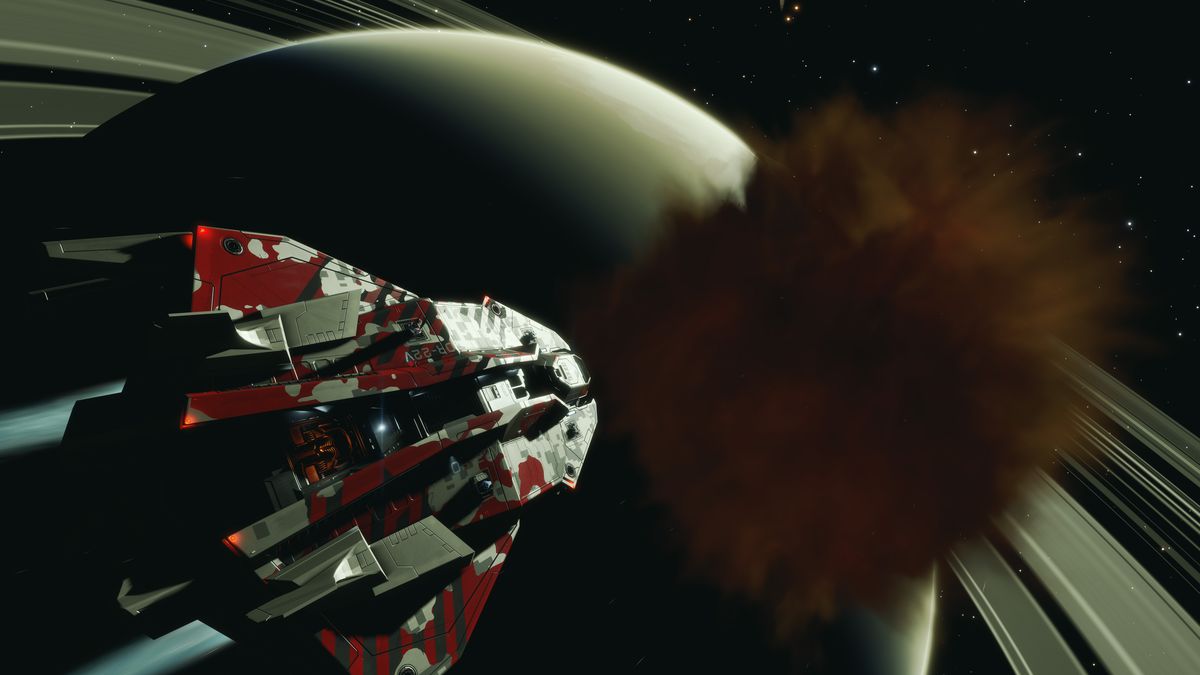 Космически кораб се насочва към тъмен, червен и сив облак в космоса.