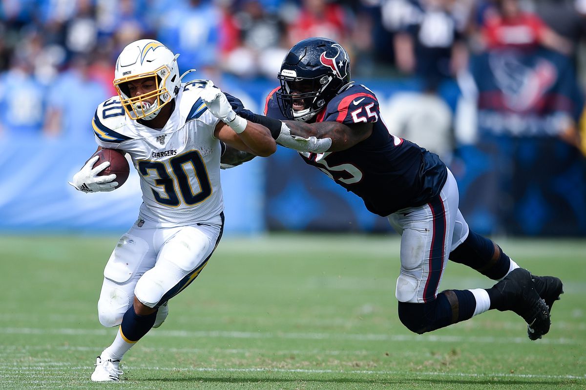 Houston Texans inside linebacker Benardrick McKinney forces Los Angeles Chargers running back Austin Ekeler out of bounds during the first half at Dignity Health Sports Park.