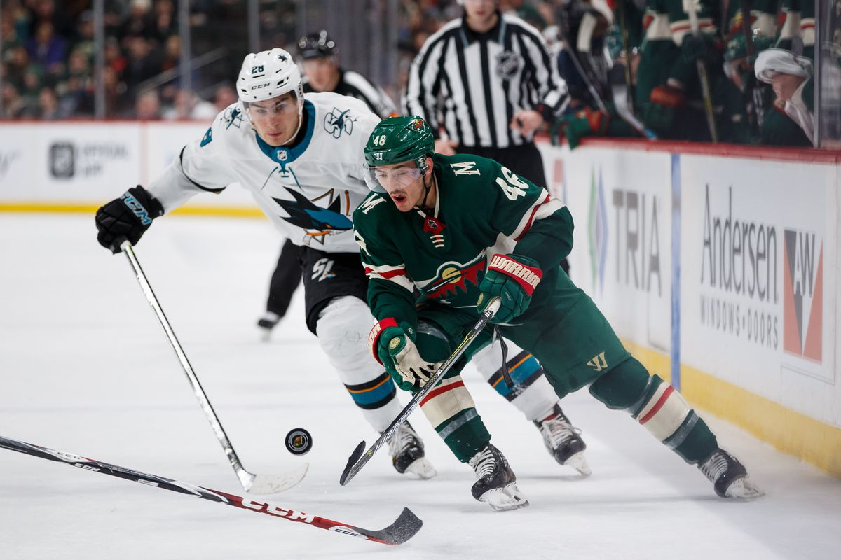 Feb 25, 2018; Minnesota Wild defenseman Jared Spurgeon (46) skates with the puck in overtime against the San Jose Sharks forward Timo Meier (28) at Xcel Energy Center. 