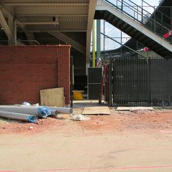 Fence temporarily removed at west end of left-field concourse - 