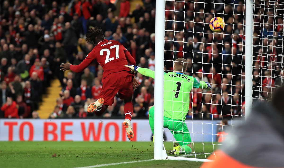 Liverpool’s Divock Origi scores his side’s first goal of the game during the Premier League match at Anfield, Liverpool.