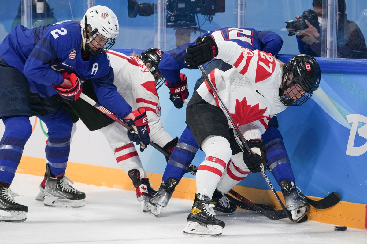 Emma Maltais 1st R of Canada vies with Kelly Pannek of the United States during the ice hockey women’s preliminary round group A match between Canada and the United States at Wukesong Sports Centre in Beijing, capital of China, Feb. 8, 2022.