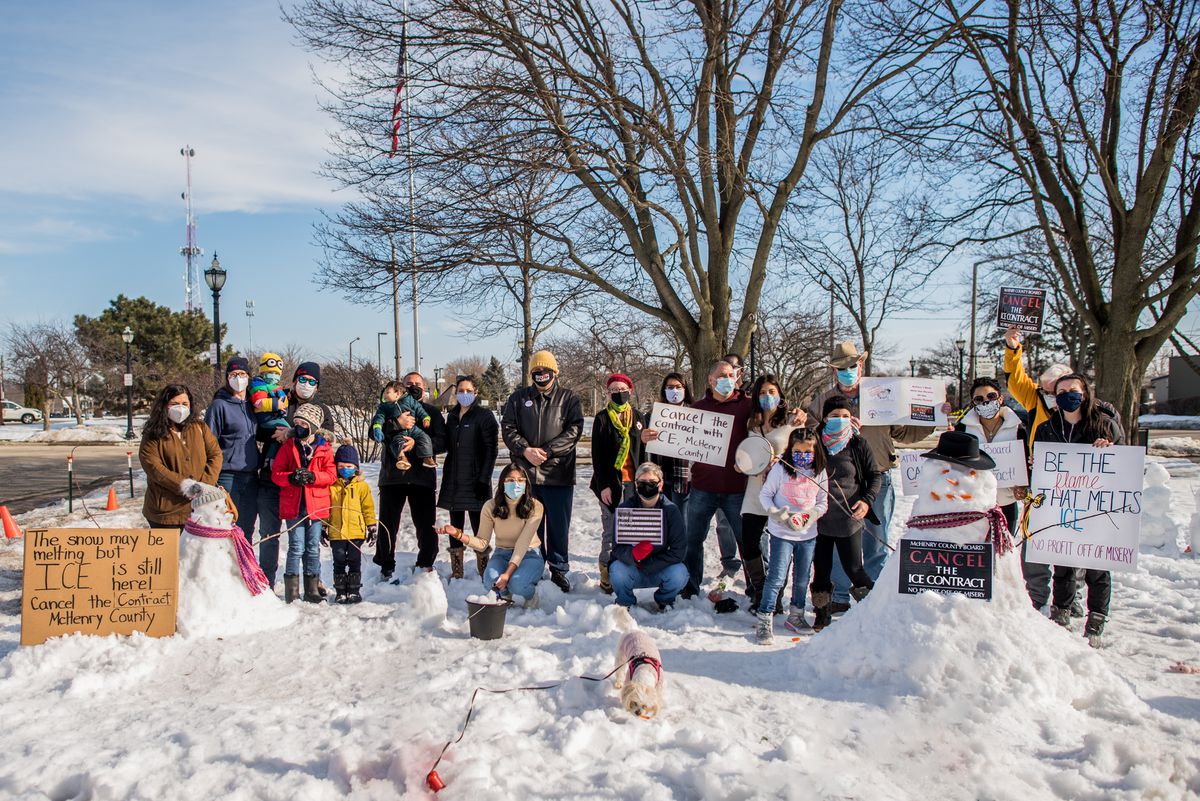 Members of a coalition calling for the end of a contract that allows the McHenry County Jail to detain those in immigration custody held an event Feb. 27 in Crystal Lake to draw attention to the contract.