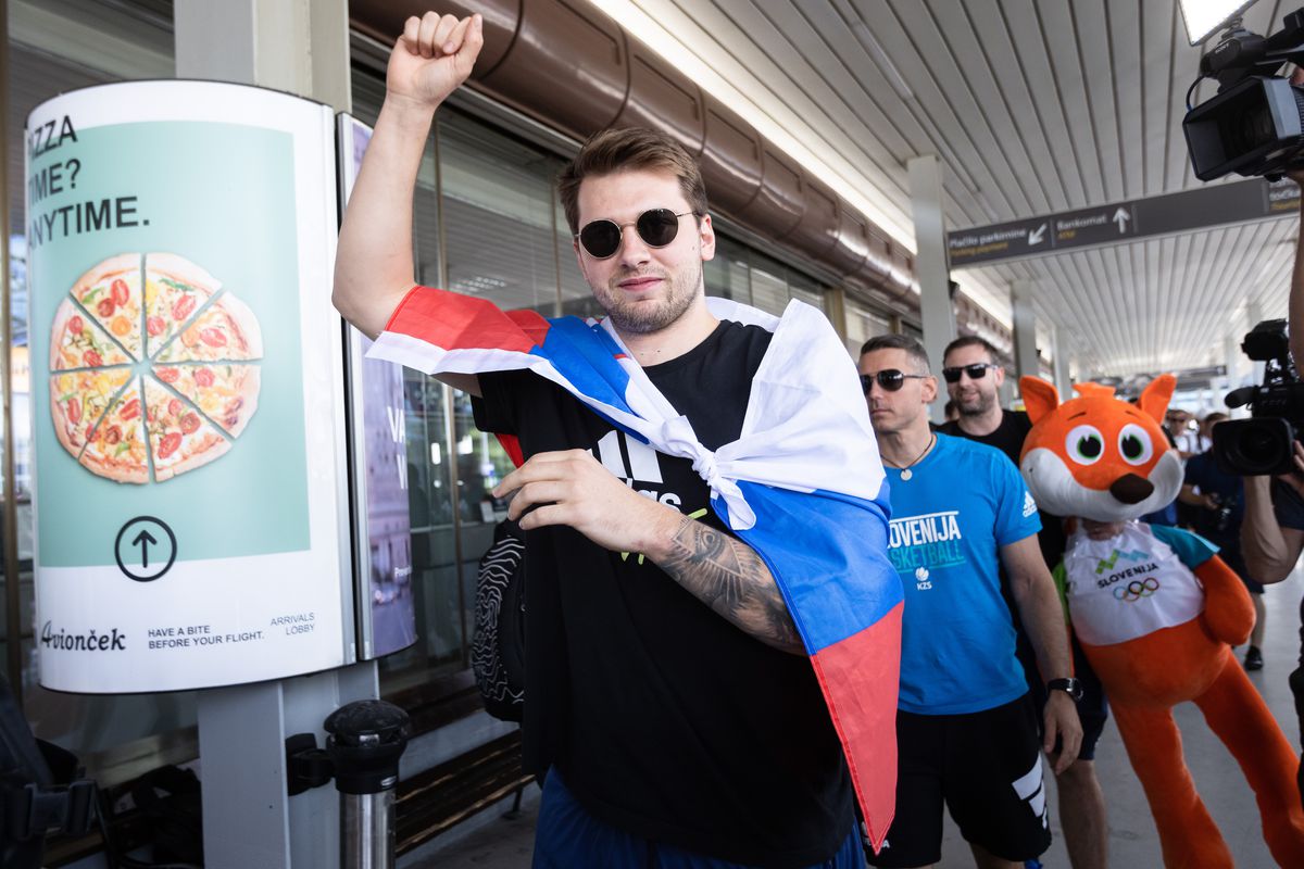 Luka Doncic waves to the fans as Slovenian basketball team...