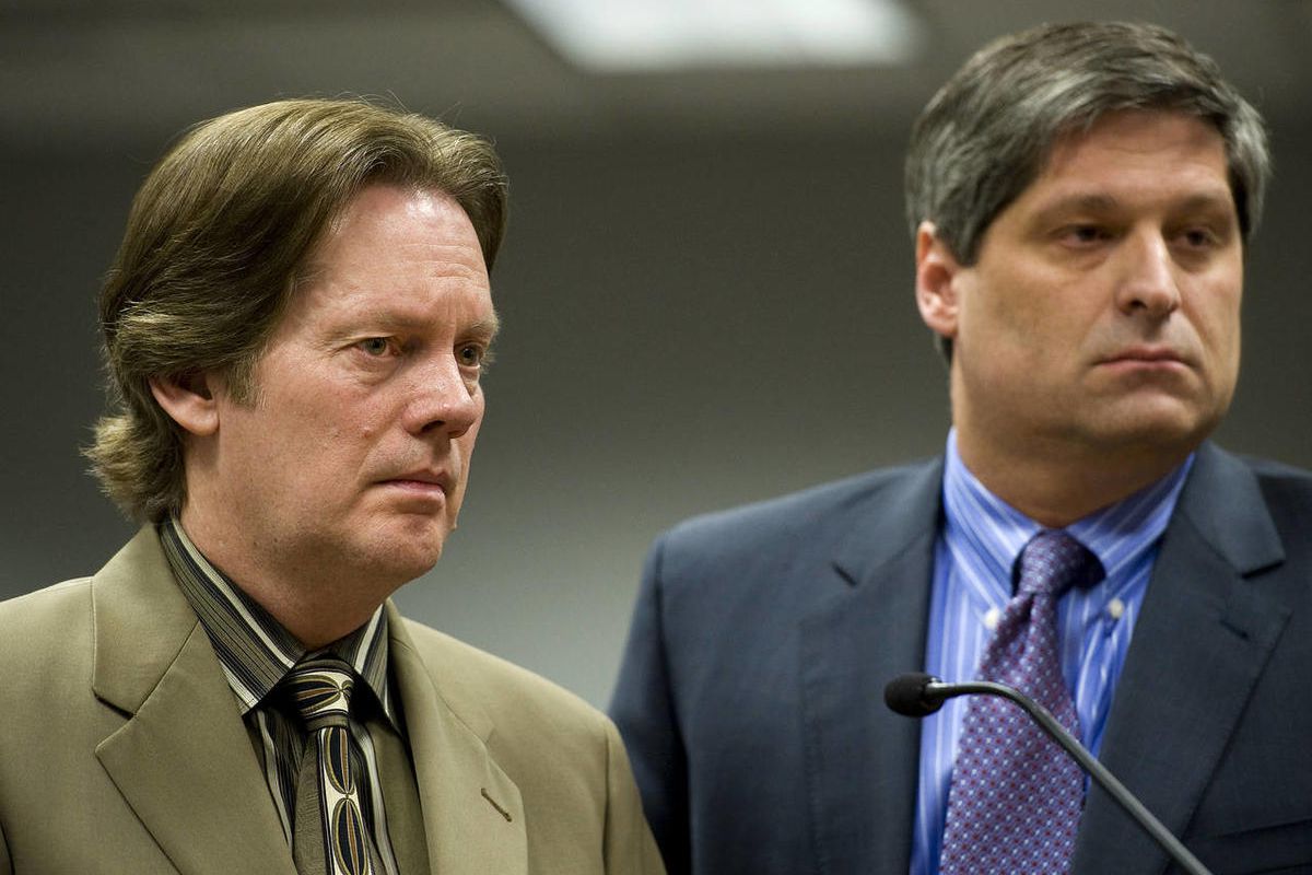 Keith Brown, left, stands at the podium with attorney Steven Shapiro as  Fourth District Judge David Mortensen delivers Brown's sentence at the Fourth District Courthouse in Provo on March 31, 2011.