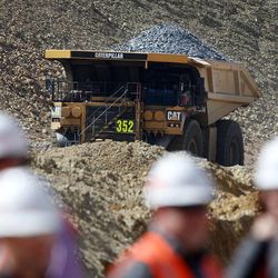 A truck carries up to 340 tons of material during a media tour of Kennecott's Bingham Canyon Mine and slide Thursday, April 25, 2013.