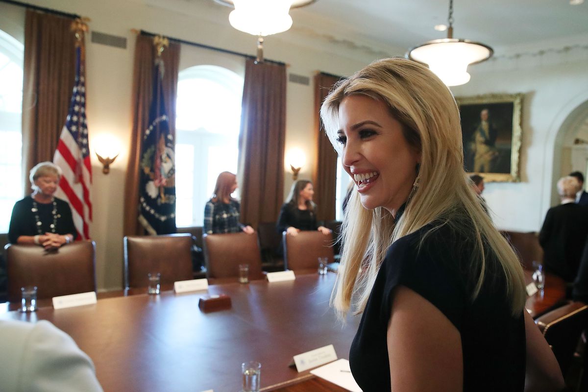 Ivanka Trump sits at a table for a meeting in the White House.