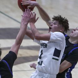 Action in the Bingham at Copper Hills boys basketball game in West Jordan on Tuesday, Feb. 2, 2021.