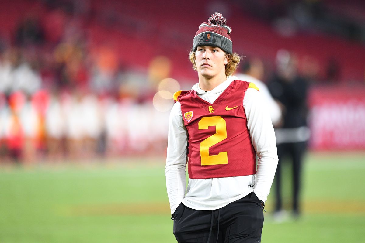 USC Trojans quarterback Jaxson Dart walks off the field after a college football game between the Oregon State Beavers and the USC Trojans on September 25, 2021, at Los Angeles Memorial Coliseum in Los Angeles, CA.