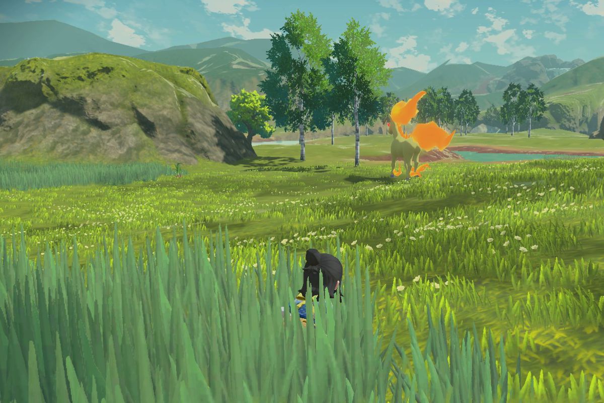 A Pokémon trainer hides in the grass to avoid the gaze of an Alpha Rapidash in Pokémon Legends: Arceus