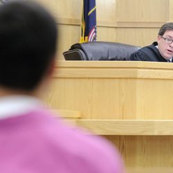 Judge Brian Cannell speaks to Jason Relopez in 1st District Court during a preliminary hearing on Thursday, Aug. 6, 2015. Relopez was bound over to stand trial for rape and aggravated sexual assault.