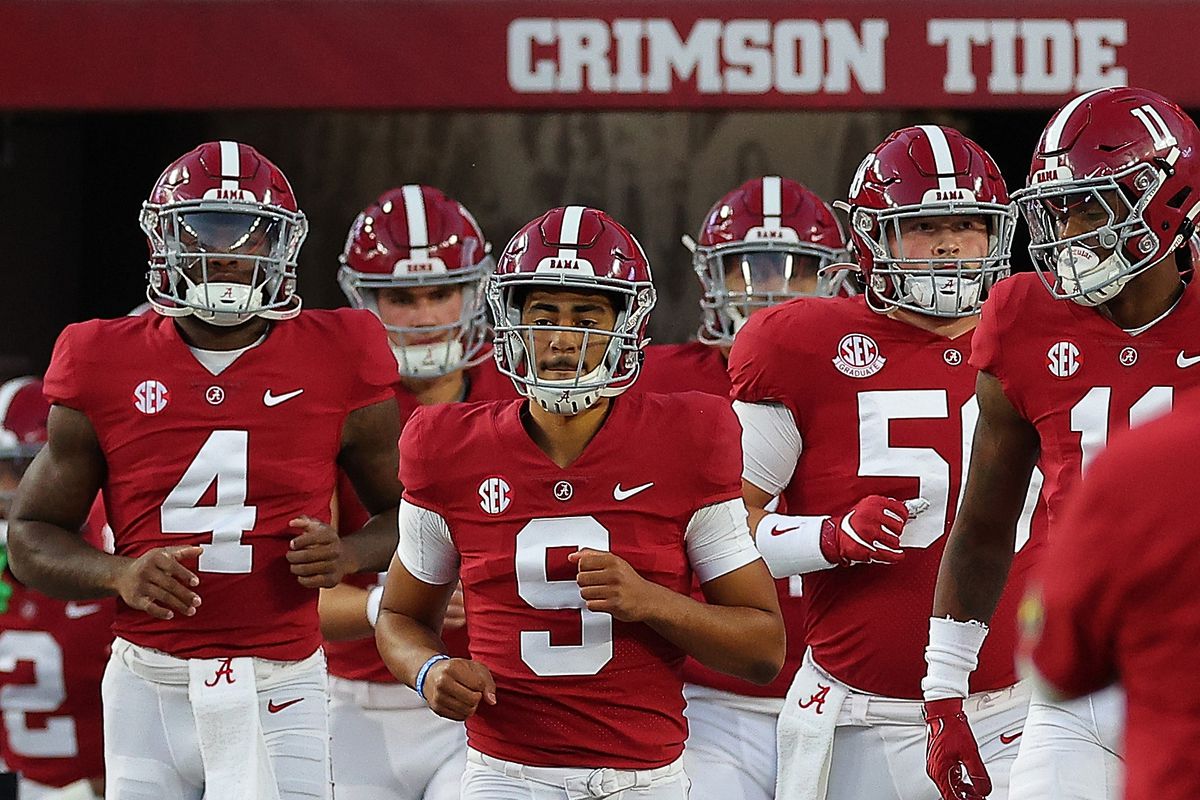 TUSCALOOSA, ALABAMA - OCTOBER 08: Bryce Young #9 of the Alabama Crimson Tide leads the team onto the field during pregame warmups prior to facing the Texas A&amp;M Aggies at Bryant-Denny Stadium on October 08, 2022 in Tuscaloosa, Alabama.
