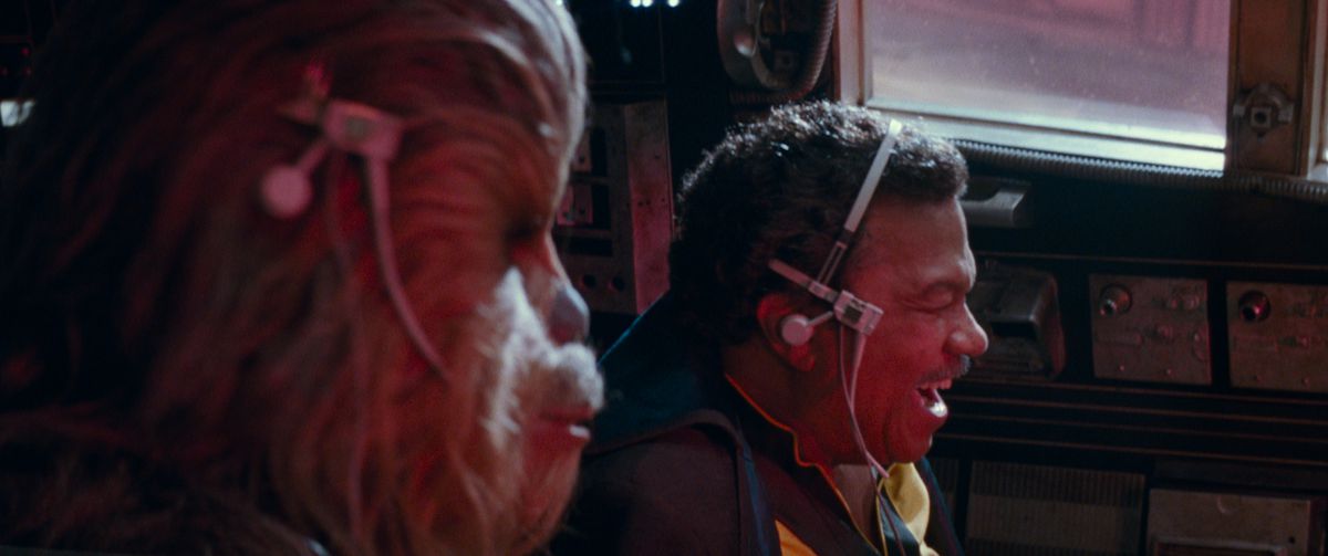 Chewbacca and Lando Calrissian fly the Millennium Falcon into battle in Star Wars: The Rise of Skywalker