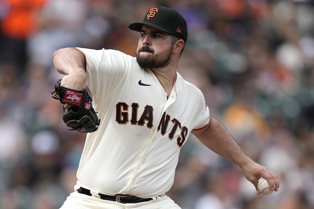 San Francisco Giants starter Carlos Rodon pitching against the Chicago Cubs on Sunday