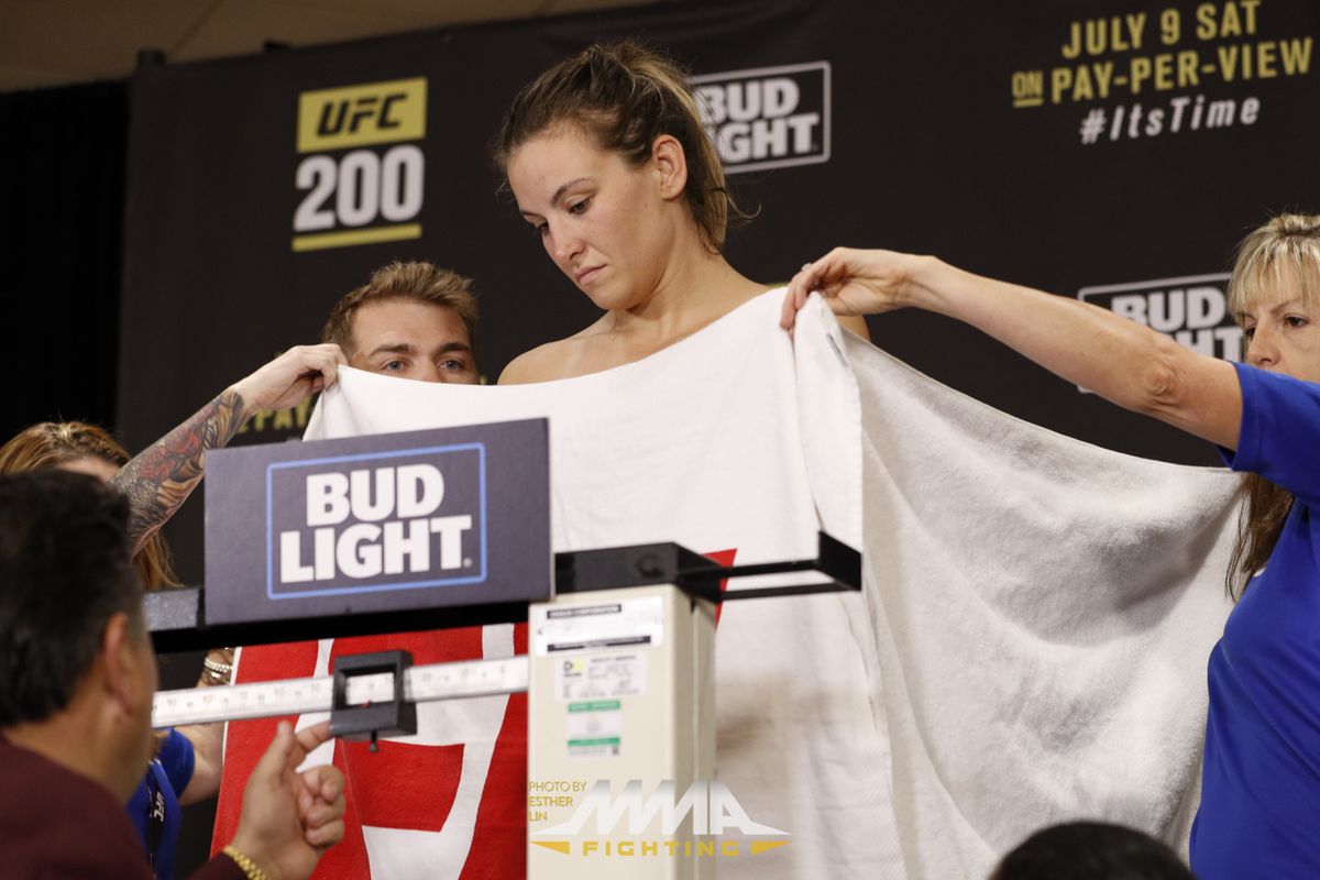 Miesha Tate needed to strip down with a towel in front of her to weigh-in b...