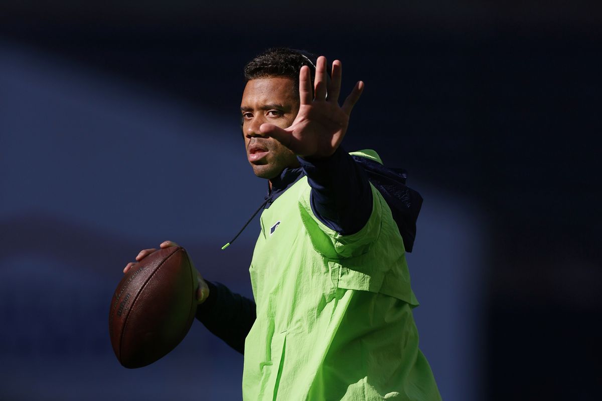 Russell Wilson #3 of the Seattle Seahawks warms up before the game against the Los Angeles Rams at Lumen Field on October 07, 2021 in Seattle, Washington.