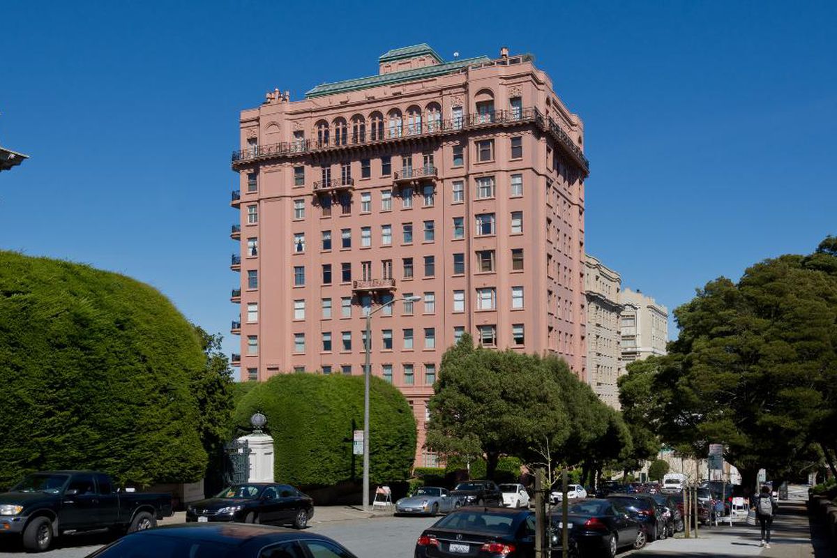 11-story beaux-arts building with salmon-colored facade. gorgeous. 