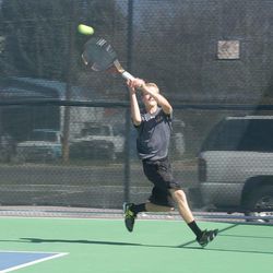 SONY DSC Senior Kaden Neuberger of Wasatch strides to make a volley during his number two singles match on Saturday morning in Heber City.