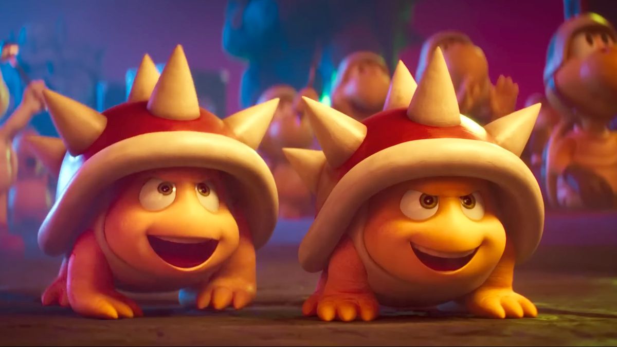 Dos Spinys sonrientes miran a Bowser en un fotograma de The Super Mario Bros. Movie.