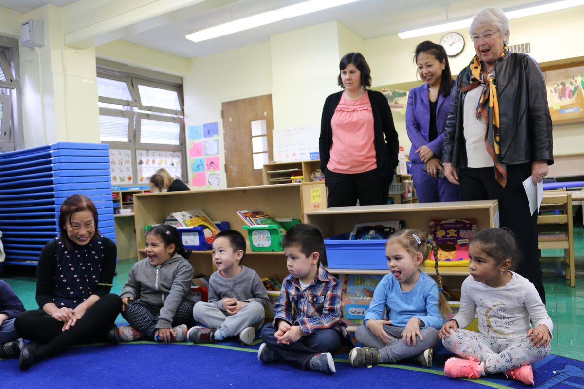 Schools Chancellor Carmen Fariña, back right, visits a Mandarin pre-K dual language program at P.S. 20 Anna Silver on the Lower East Side.