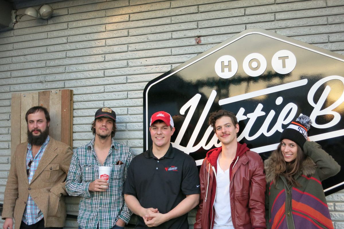 ShaneCody, Zak Appleby, Matt Myers, and Kate Toupin with their host at Hattie B's.