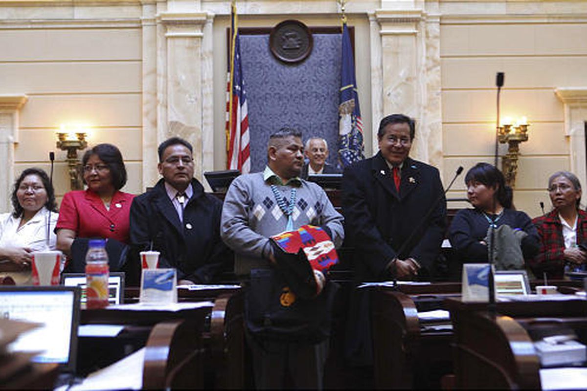 Members of various Native American tribes "” Ute, Navajo, Goshute, Northwestern Band of the Shoshone Nation, Paiute and others "” are introduced Thursday at a Utah Senate session at the state Capitol. About 30 tribal members were spending the day with Gov