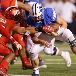 Brigham Young Cougars quarterback Taysom Hill (7) is tackled short of the goal line in two conversion attmept by the Utah Utes  in Salt Lake City on Saturday, Sept. 10, 2016. Utah won 20-19.