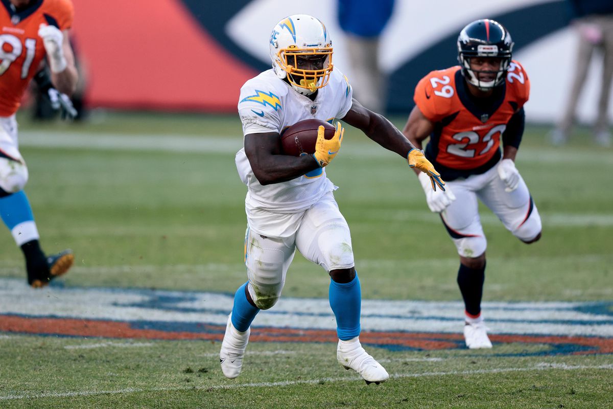 Chargers running back Troymaine Pope (35) runs the ball in the third quarter against the Denver Broncos at Empower Field at Mile High.