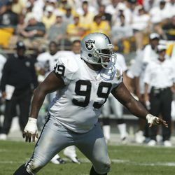 Sep 12, 2004, Pittsburgh, PA, USA;  The Pittsburgh Steelers defeat the Oakland Raiders 24-21 at Heinz Field. Warren Sapp, defensive tackle of the Oakland Raiders, playing against the Steelers.  Mandatory Credit: Photo by Brian Spurlock-US PRESSWIRE Copyri
