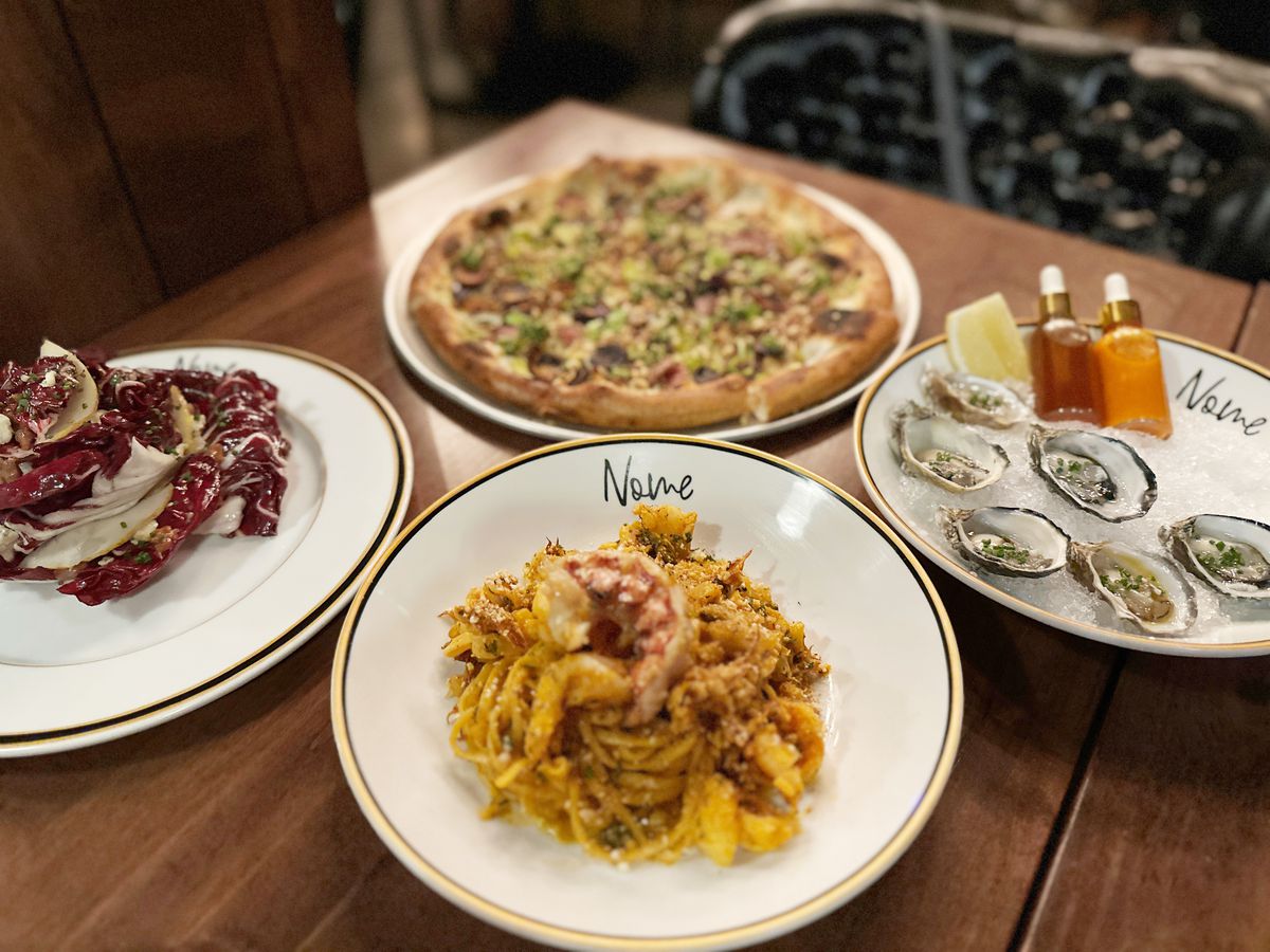 Seafood pasta, raw oysters, radicchio salad and tartufo pizza at Nome Italiano.