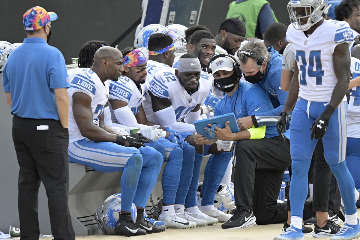 Lions players gather on the sideline. The NFL added new guidelines to help prevent the spread of coronavirus.