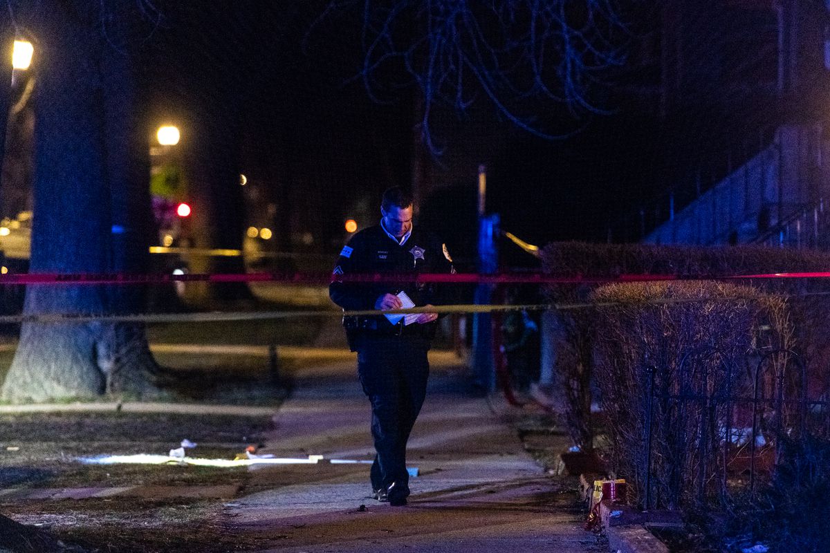 Chicago police investigate a fatal shooting on March 31 in the 500 block of North Hamlin Avenue in East Garfield Park.
