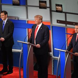 Republican presidential candidate, Sen. Marco Rubio, R-Fla., Republican presidential candidate, businessman Donald Trump  and Republican presidential candidate, Sen. Ted Cruz, R-Texas, from left, participate during the Fox Business Network Republican presidential debate at the North Charleston Coliseum, Thursday, Jan. 14, 2016, in North Charleston, S.C. (AP Photo/Rainier Ehrhardt) 