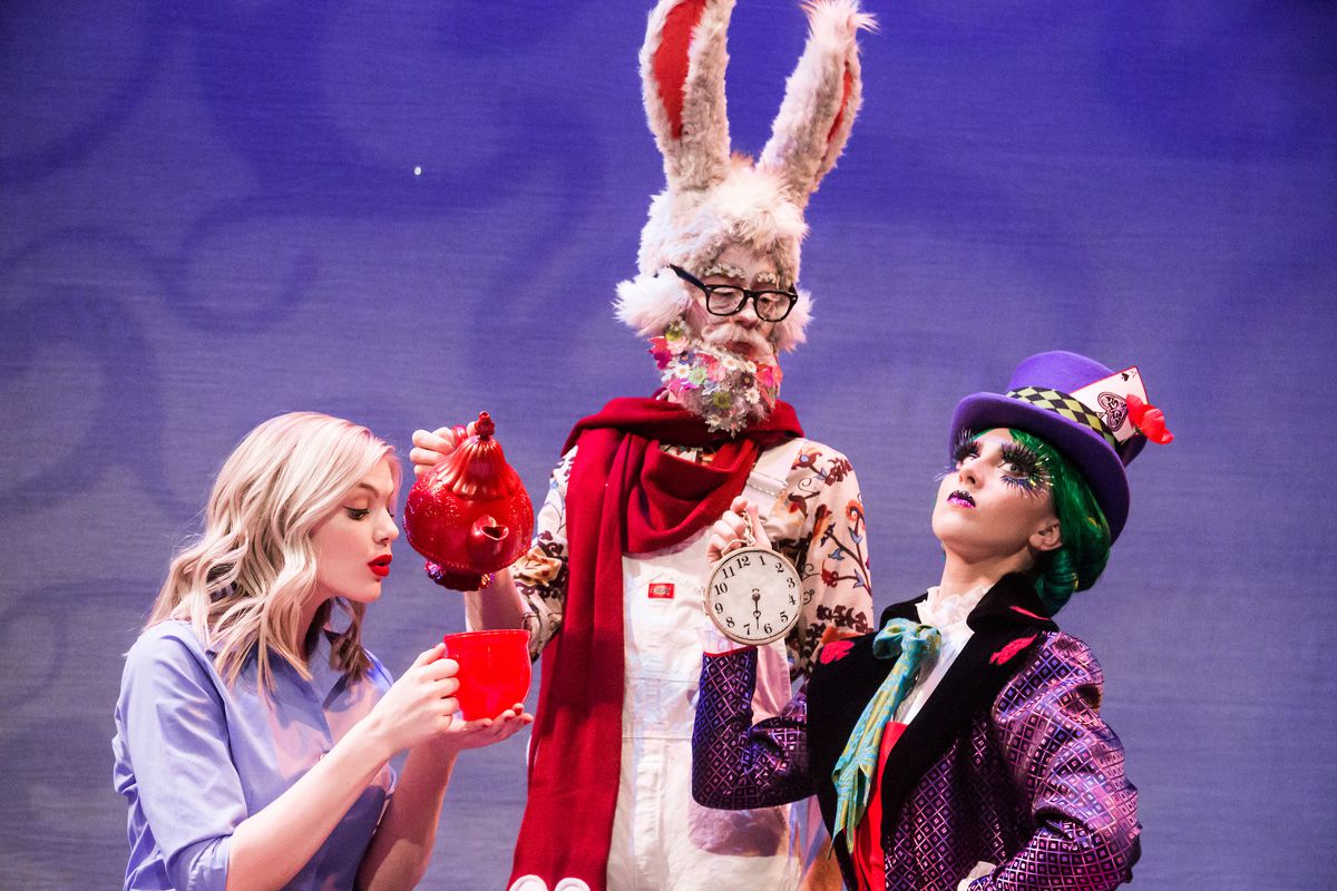 Alice (Krista Saltmarsh), White Rabbit (Daniel Wallentine) and Hatter (Kenzie Belnap) enjoy some tea at the tea party. Brigham Young University premieres its revamped production of Frank Wildhorn's "Wonderland" on Thursday, Jan. 24. The production runs th