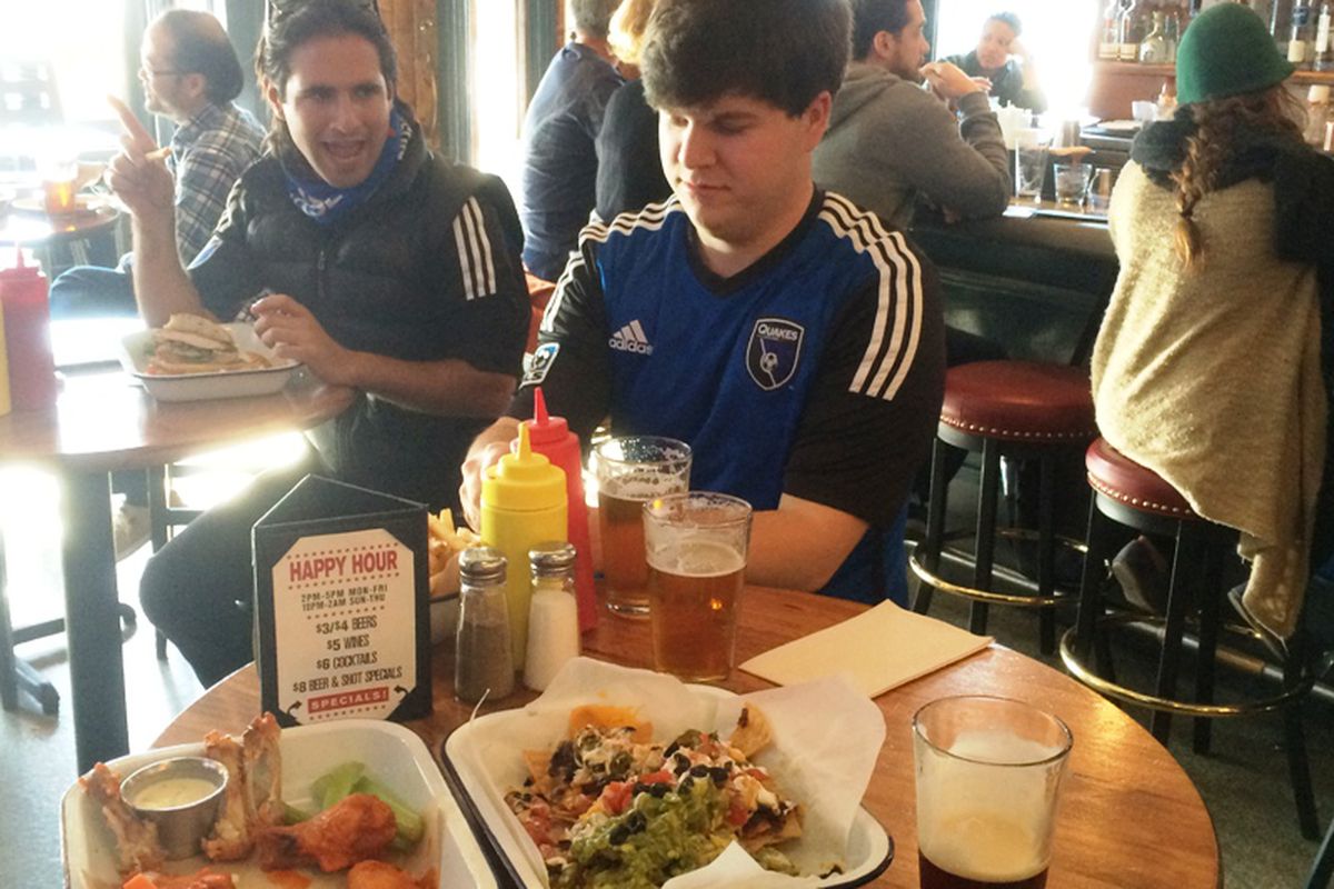 San Francisco-based fans Tomas and Geoff revel in watching Quakes soccer, quaffing quality pints, and consuming craploads of kick-ass natchos at the San Francisco Athletic Club Saturday, April 17, 2015.